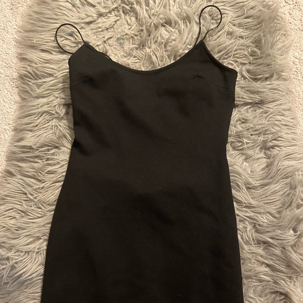 black bodycon dress with open back and thin straps